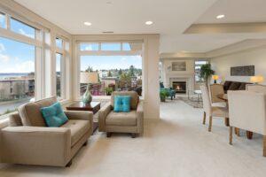 airy living room with windows 